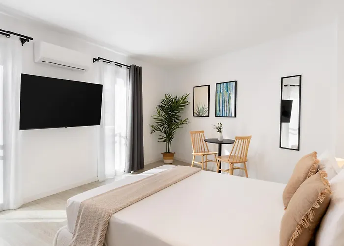 Má Homes Postigos Apartahotel Málaga